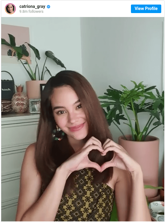 Catriona Gray feed families in Tondo