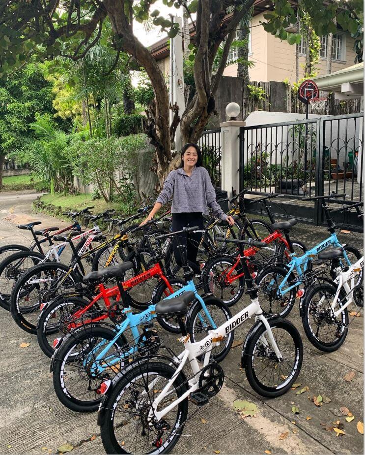 Gretchen Ho giving away bikes
